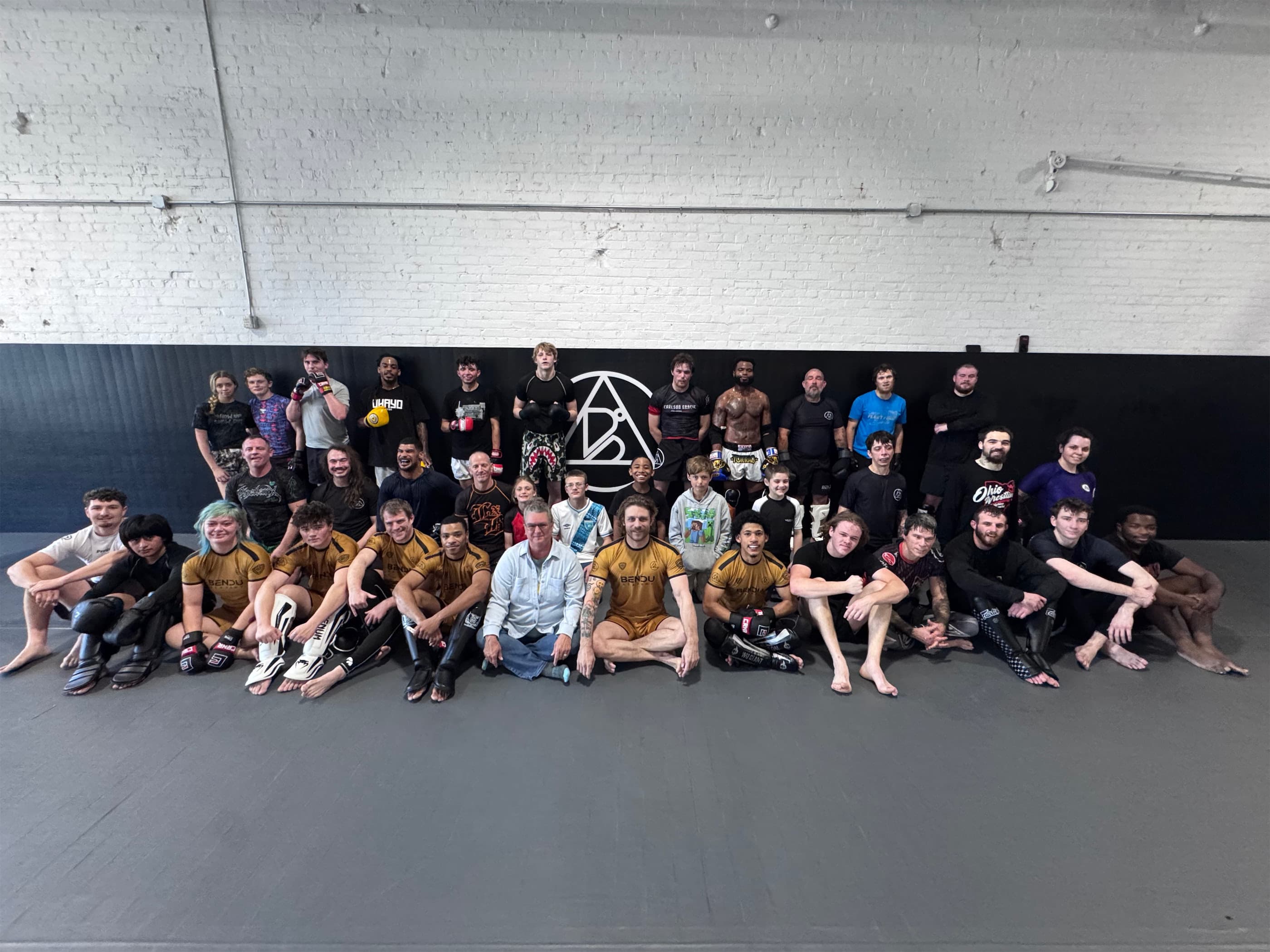 The Bendu Academy community gathered on the mats